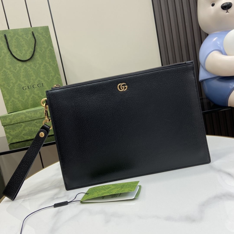 G*u*i clutch bags